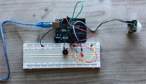 Image result for PIR Sensor Arduino Code with LED Breadboard