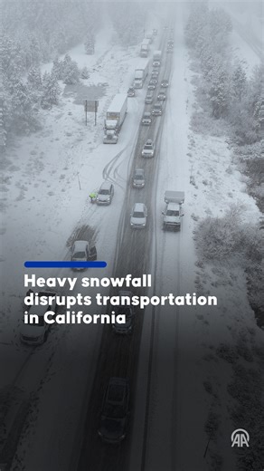 🚚 Trucks pile up near Donner Pass in Truckee, California, as heavy snowfall blankets the region and severely disrupts traffic ❄️ Treacherous road conditions and limited visibility force vehicles to slow or stop, causing major delays along this critical mountain route | Anadolu Agency