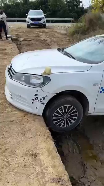 What Should I Do If All Four Wheels Accidentally Fall Off A Curb While Reversing?