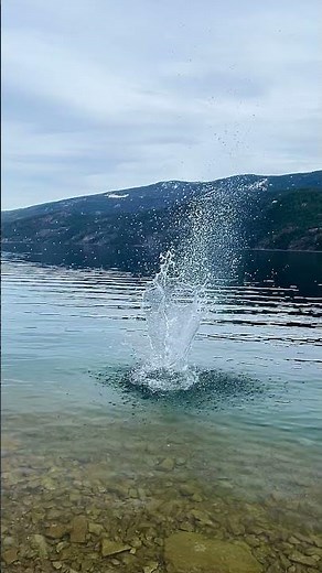 Big splash on the water | Water splashing rocks in slow motion | 4K