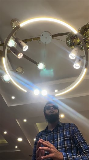 Contemporary LED Ring Chandelier with Track Spotlights Sleek modern LED chandelier featuring a bright circular ambient ring and adjustable directional spotlights for dynamic and stylish illumination. Price 14500 with delivery Order now www.apnabazar.com.pk OR https://wa.link/apnabazar WhatsApp on 03009794222/0321-4246-436.