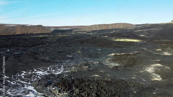Spectacular 4K drone footage of the Geldingadalir Volcano in Iceland. Witness breathtaking aerial views of this active volcanic eruption and the surrounding rugged landscape
