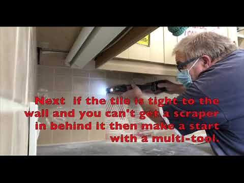 Getting the tiles off the wall with out damaging the drywall behind