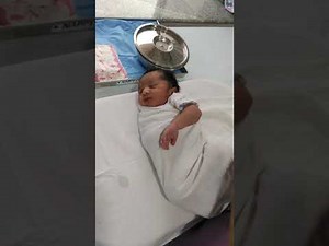 Learning to change nappy of newborn baby.