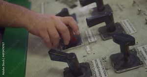 Person tilts the lever to turn it on. Control buttons panel