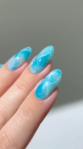 490K views · 13K reactions | 﫧 obsessing over marble nails lately :) and I love how bold and vibrant this teal color is !! Using: @gelcare.official Coconut Milk | Jelly Teal | French Alps | Blooming GelFor 15% off use code: AISTE (*aff) #greennails #bluenails #marblenails #tealnails #pastelnails #springnails #nails #nailinspo #nailart gradient ombre marbles, cute nails , almond nails , nail art tutorial, #nailsoftheday #naildesigns #nailsonfleek | Heygreatnails | Facebook