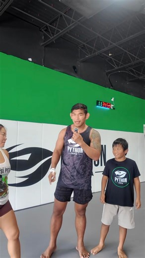 🥊 PYTHON MMA POLL TIME! 🐍 Be honest now… Who would you rather get punched by? ❤️ Bi Nguyen – a professional fighter with hands of steel 👊😅 👍 10-year-old Ethan Thang – looks sweet… but don’t let that fool you 😆💥 Drop your vote below! 👇 Let’s see who the brave ones are today! 🐍🔥 | Python MMA USA