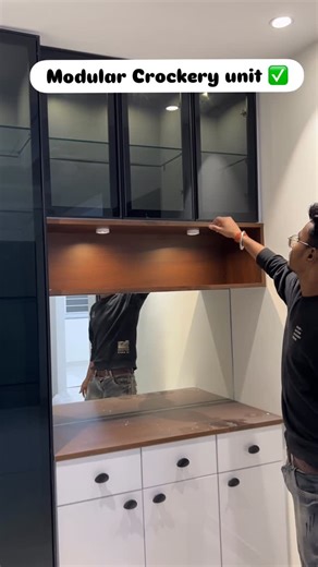 Team_Father on Instagram: "Love this unique design ❤️ Share with your family 🫰🏻 These are traditional, often larger, units that serve as a focal point in a dining room or living area. They can feature a combination of glass doors for display, solid cabinets for concealed storage, and drawers for smaller items like cutlery and table linens. Team Father interior work & design 🔖 Prakhar Devanshi 📞8808556040 Dm me for more details 📩 📍#varanasi #inspiration #modularity #interiordesign #design #