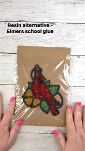 Epoxy Resin alternative using Elmers Clear School Glue! 👍 I have been testing different things to use instead of Resin for our faux stained glass sun catcher cut outs. I hope this is helpful! 🥰 #resinalternative #suncatcher #crushedglass #fauxstainedglass #elmersglue #glassartist #shatteredglass #craftparties #CraftingCommunity | Amber Strong DIY