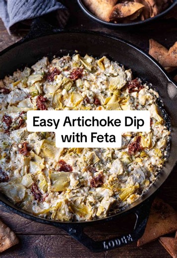 Easy Artichoke Dip with FETA - the easiest appetizer you’ll make! Take your artichoke dip from good to great with feta, olive oil, sun-dried tomatoes, and a bit of extra spice in this feta artichoke dip recipe! This artichoke dip features all the normal ingredients you expect to see. We just spruced it up with a few additions to make it extra tasty! Here’s everything you’ll need: ▢ 1 (15-ounce) can artichoke hearts, roughly chopped ▢ 7 ounces block creamy feta cheese ▢ 1/2 cup whole milk Greek y