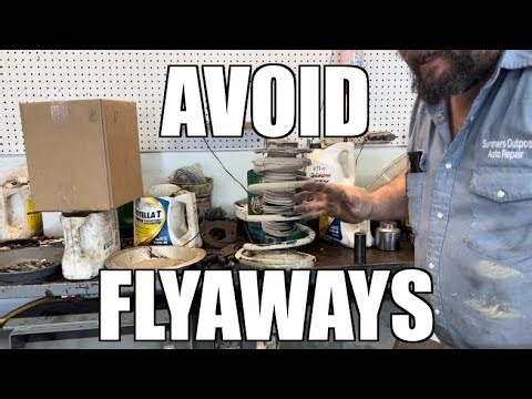 Disassembly and replacement of a strut using a Harbor Freight spring compressor