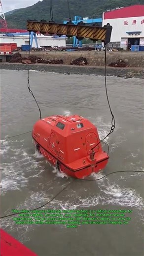 Life Boat Onload Test: Orange Lifeboat Floating on Calm Water Surface Satisfying