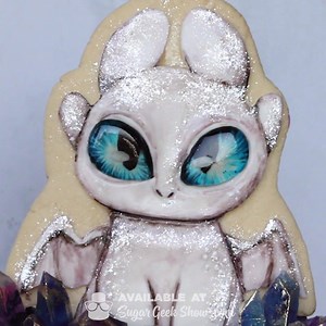 1.1M views · 6K reactions | Happy national cake decorating day! This light fury dragon cake is one of my favorite cakes from the past year!  Learn how to make a gravity-defying island structure, kohakutou gummy crystals, gelatin waterfalls and a fun light fury cookie cake topper with isomalt eyes! Become a member to get this tutorial along with hundreds of others.  https://sugargeekshow.com/class/light-fury-cake-tutorial/ | Sugar Geek Show | Facebook