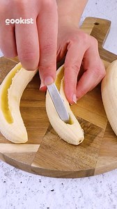 Chocolate banana in puff pastry: you've never tried such an easy and delicious snack! INGREDIENTS 2 rolls of Puff pastry 6 Bananas Hazelnut cream Egg for egg wash Sugar METHOD 1. Unroll the puff pastry on a cutting board and then cut it into stripes. 2. Peel bananas and carve them in the middle. Fill the middle with hazelnut cream. 3. Wrap them with puff pastry stripes and transfer them to the baking tray covered with parchment paper. 4. Brush banana rolls with egg wash and sprinkle with sugar. 