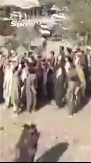 Huge crowd gathers as Taliban force boy to execute family’s killer in Afghanistan #afghanistan