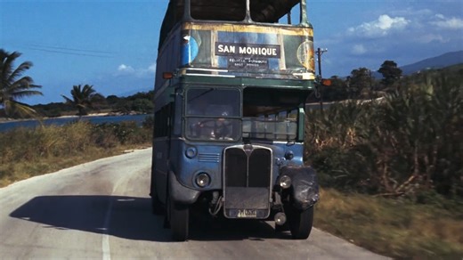 119K views · 2.6K reactions | “All change, end of the line.” Bond (Roger Moore) and Solitaire (Jane Seymour) escape the San Monique police in a double decker bus in LIVE AND LET DIE. | James Bond 007 | Facebook