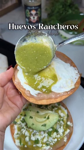 Maria Guzman on Instagram: "Huevos rancheros en salsa verde Ingredients: For the green salsa: • 8 tomatillos • 2 serrano peppers • 1 jalapeño pepper • A piece of onion • 1 garlic clove • 1 cup of the cooking water • A handful of cilantro • 2 teaspoons Spanglish Asadero Green Chile seasoning • 1 teaspoon salt For the huevos rancheros: • Corn tortillas • Oil (for frying) • Eggs • Salt, to taste • Refried beans • White onion, finely chopped • Panela cheese (or cheese of your choice) • Fresh cilantr