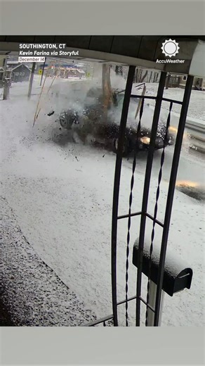 Out-of-Control Truck Crashes into Pole on Snowy Road
