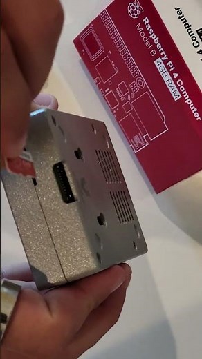 Insert MicroSD card (w/ Umbrel OS) into the Raspberry Pi 4