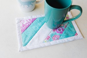 10K views · 46 reactions | This is part 1 of our mug rug video tutorial. Mug rugs are beautiful, make fantastic gifts, and are easy to make! Learn how to make one with this video. Get the written instructions here: https://www.allfreesewing.com/Video-Tutorials/How-to-Prep-a-Mug-Rug You can also find part 2 here: https://www.allfreesewing.com/Video-Tutorials/How-to-Seam-Bind-a-Mug-Rug | AllFreeSewing | Facebook