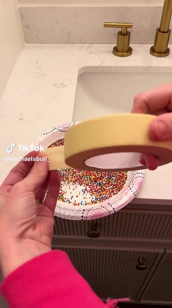 My son is obsessed with sprinkles, so it only made sense for our elf to turn water into sprinkles ✨ ngl I was nervous about the mess for this one but the sprinkles just dissolved right away and went down the drain! 👏🏼 #elfontheshelf #christmas #momsoftiktok #momtok #momlife