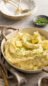 Fluffy, creamy Mashed Potatoes come together with a few simple ingredients and very little time. They are the perfect rich, buttery side dish and are so versatile. Learn how to make these ahead of time, easily reheat them, or freeze them for holiday meal prep! | Preppy Kitchen