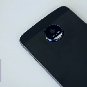 1.5M views · 20K shares | The Moto Z charges insanely fast with swappable backs that add a projector or better speakers. | Verge Reviews | Facebook