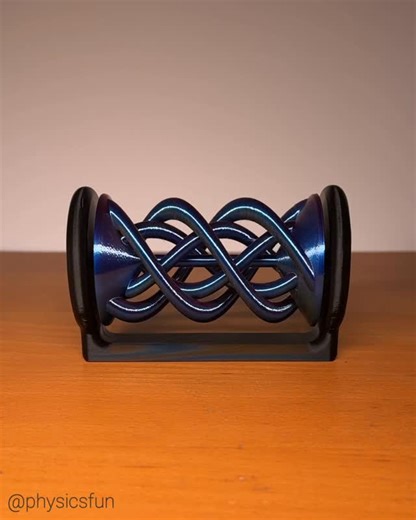 physicsfun on Instagram: "Iridescent Dual Spiral: another fun 3D print with dual spiraling motion this time using tricolor iridescent silk filament that produces a color changing effect. More kinetic art from RJ Design. ➡️ Follow the link in my profile for info on where to get this inexpensive kinetic art (or the stl files) and many other amazing items featured here on @physicsfun #helix #kineticart #physicstoy #illusion #spinner"